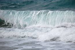 Welle am Strand von Kreta